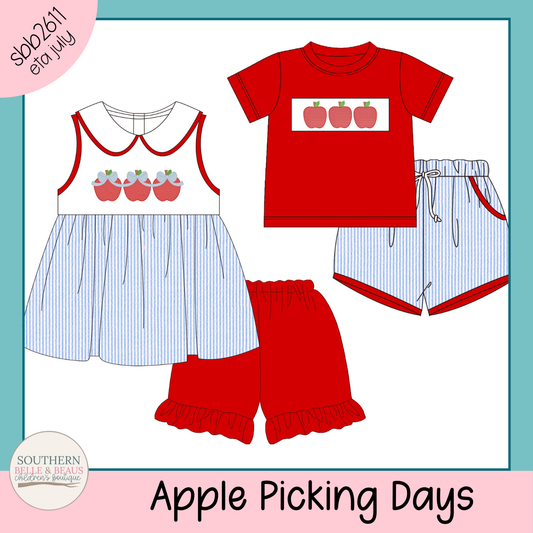 Children's clothing set with red and white design on a light blue background