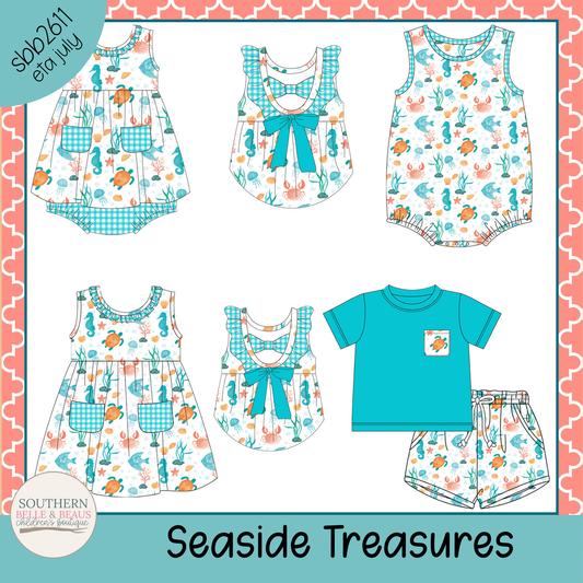 Collection of children's clothing with seafish and crab patterns on a white background.