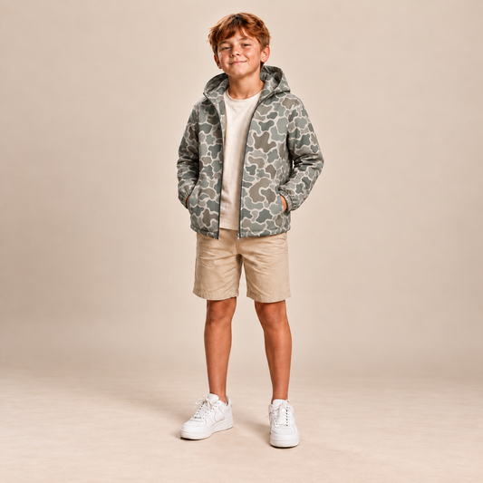 Front view of boys vintage camo rain jacket with matching printed hood lining